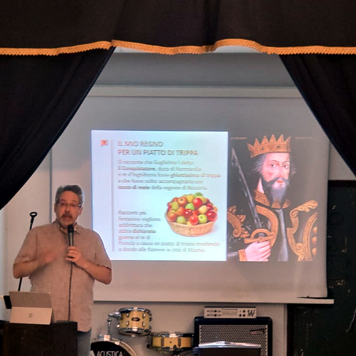 Giving a presentation on the history of tripe